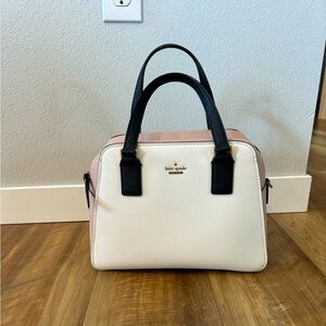 Kate Spade handbag. White/blush with black handle 11” x 8”
